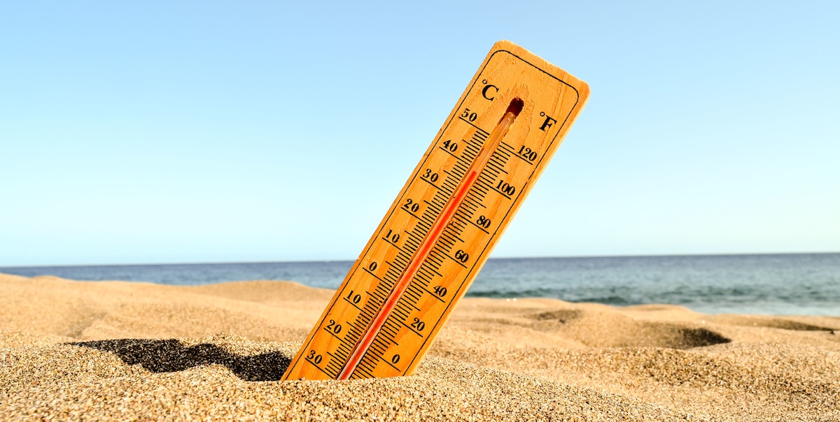 closeup shot thermometer beach sand